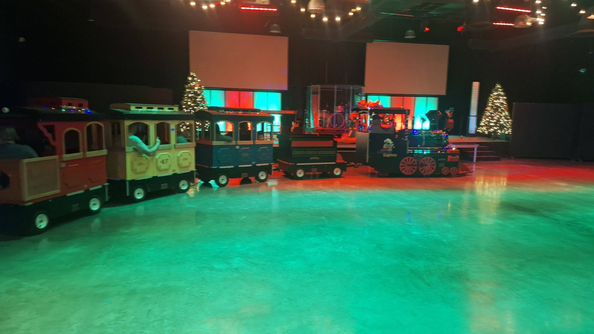 Families riding the Choo Choo Express trackless train