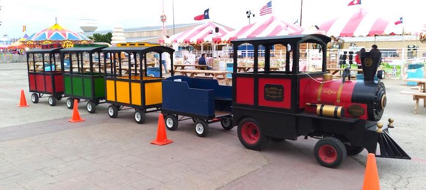 Riders aboard the Choo Choo Express trackless train