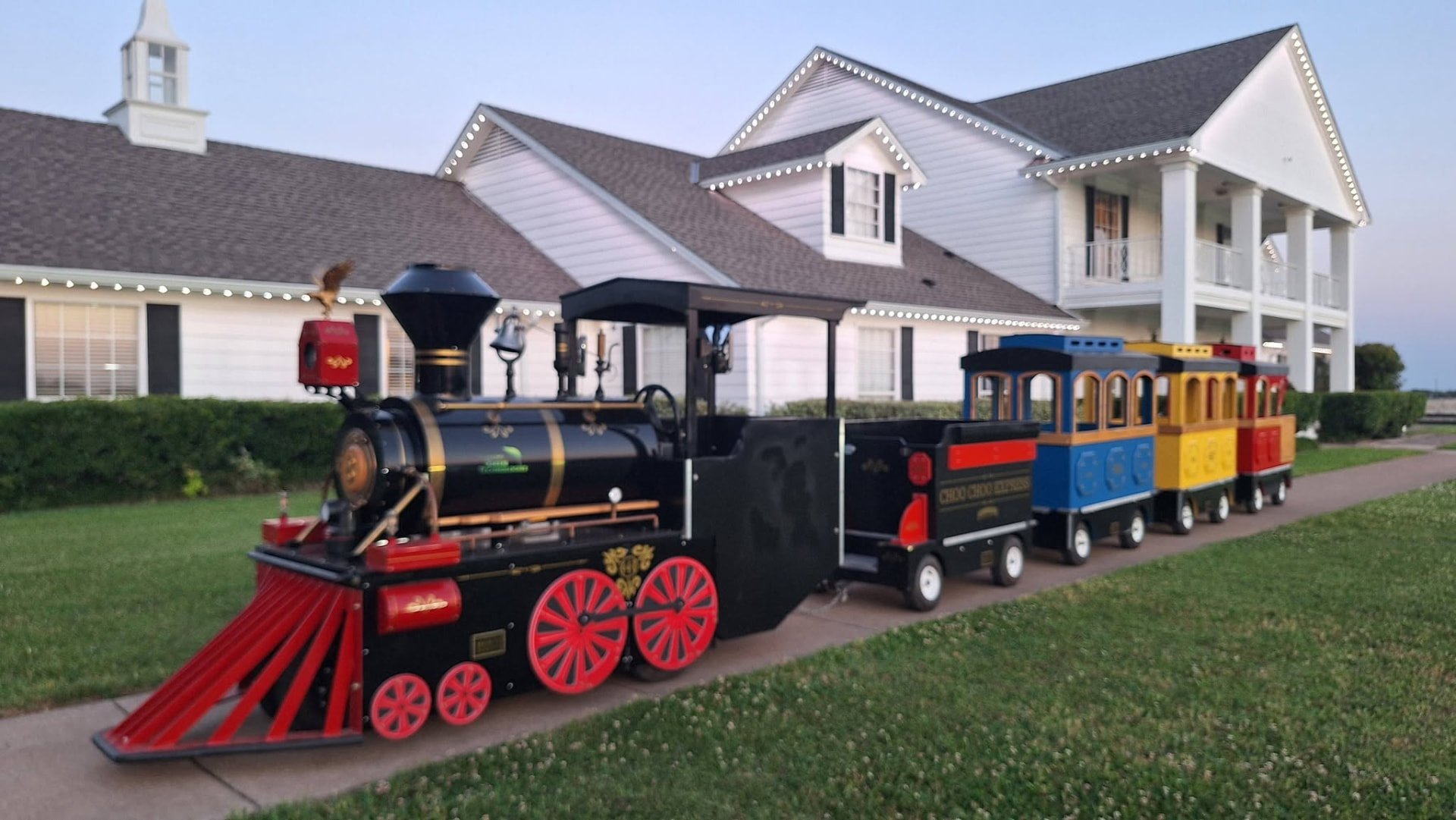 Parents and children riding the train together