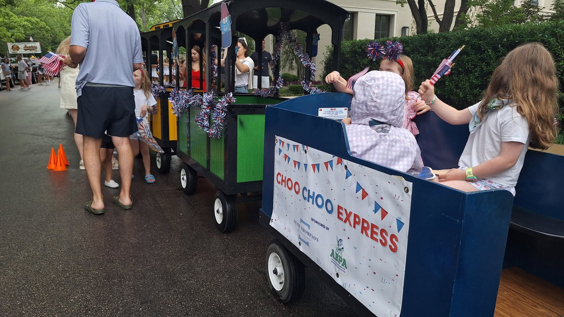 Families riding the Choo Choo Express trackless train
