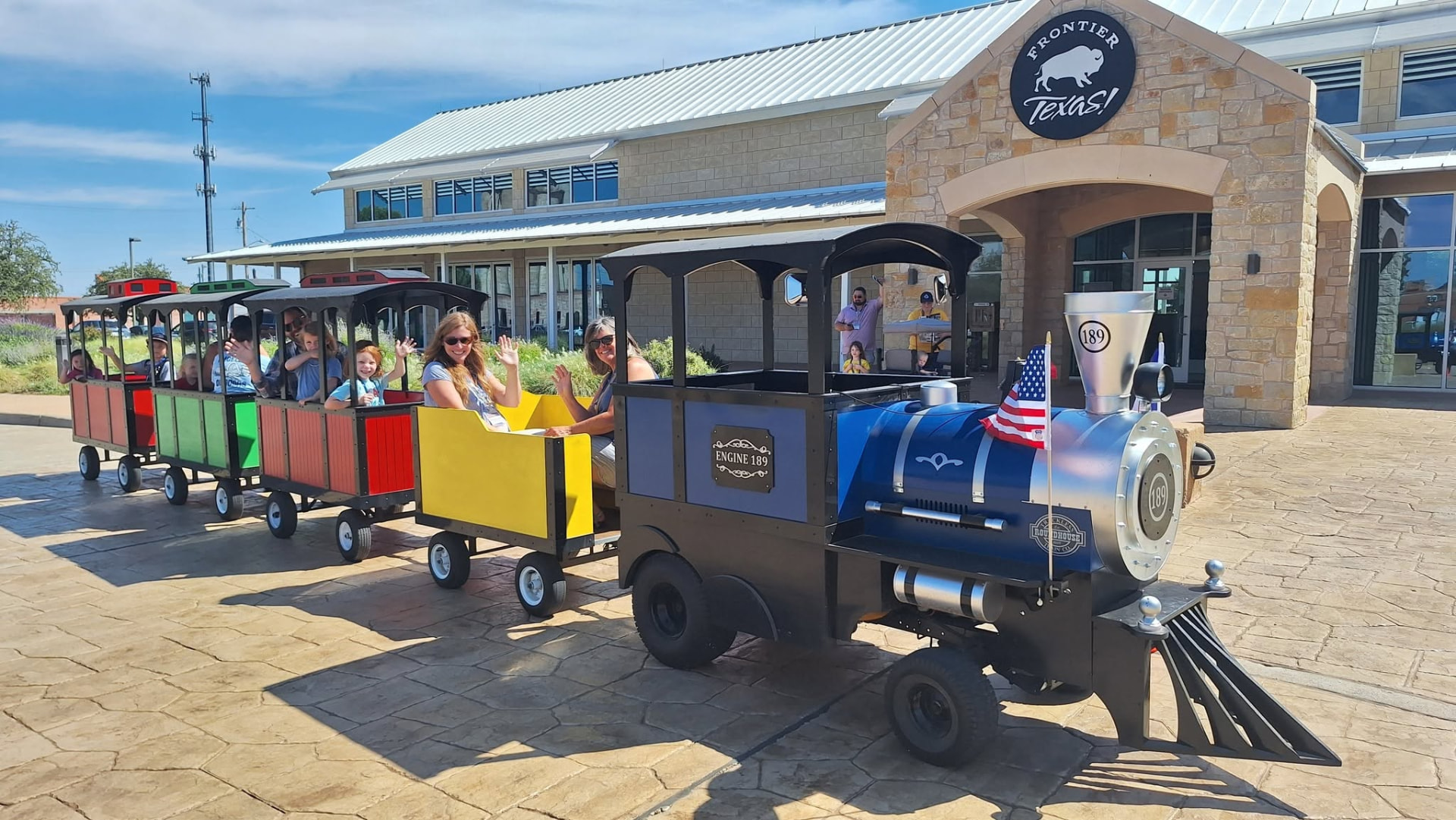 Smiling riders aboard the Choo Choo Express