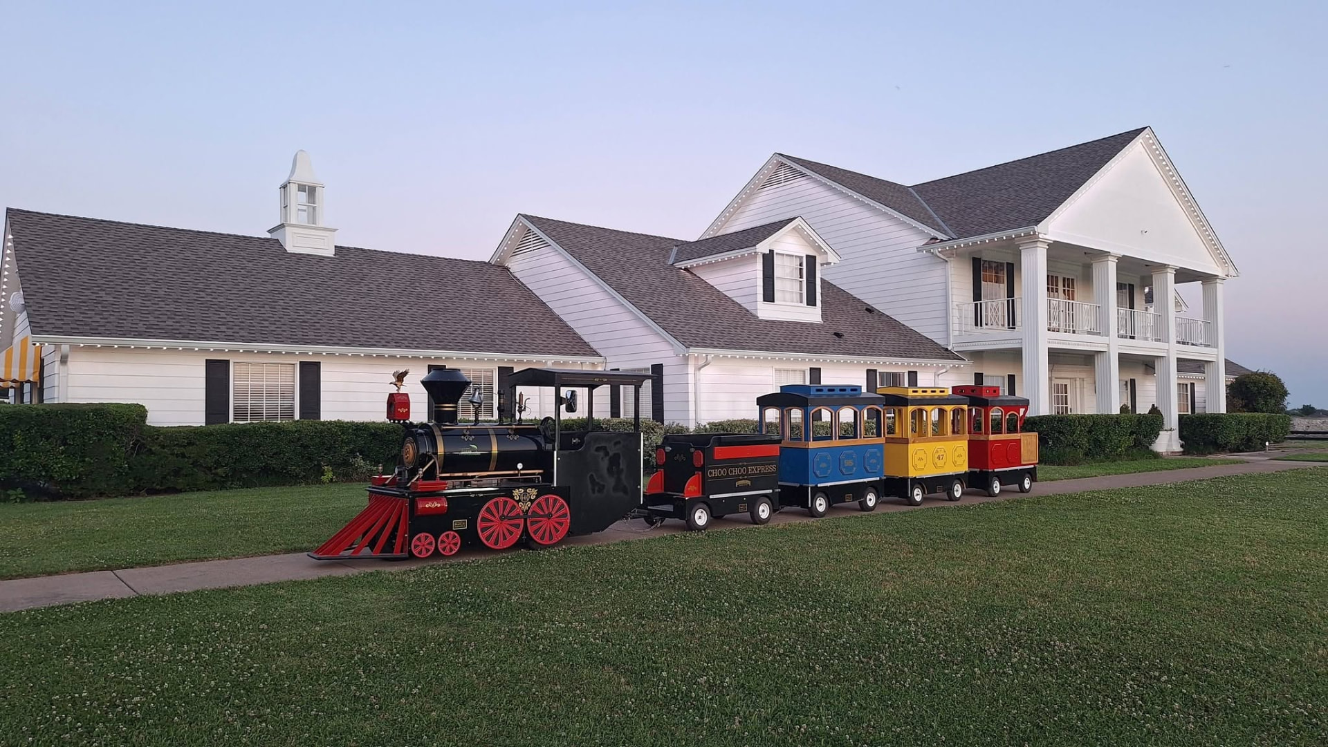 Smiling riders aboard the Choo Choo Express